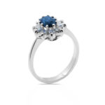 Anillo flor garra diamantes zafiro